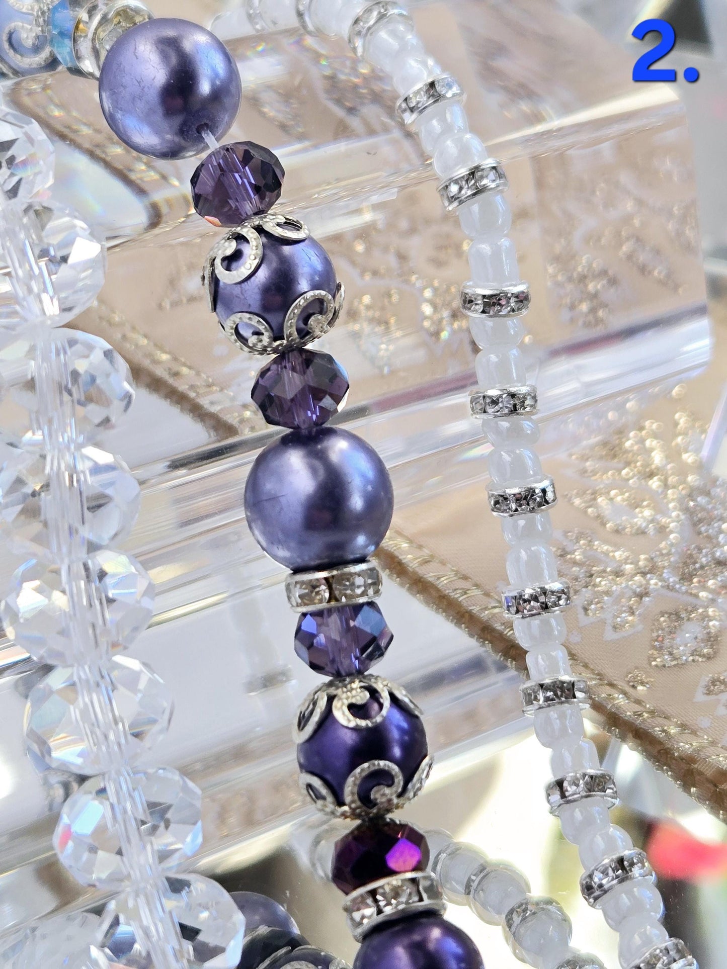 Three Strand Packages of Assorted Glass Pearls and Spacer Beads