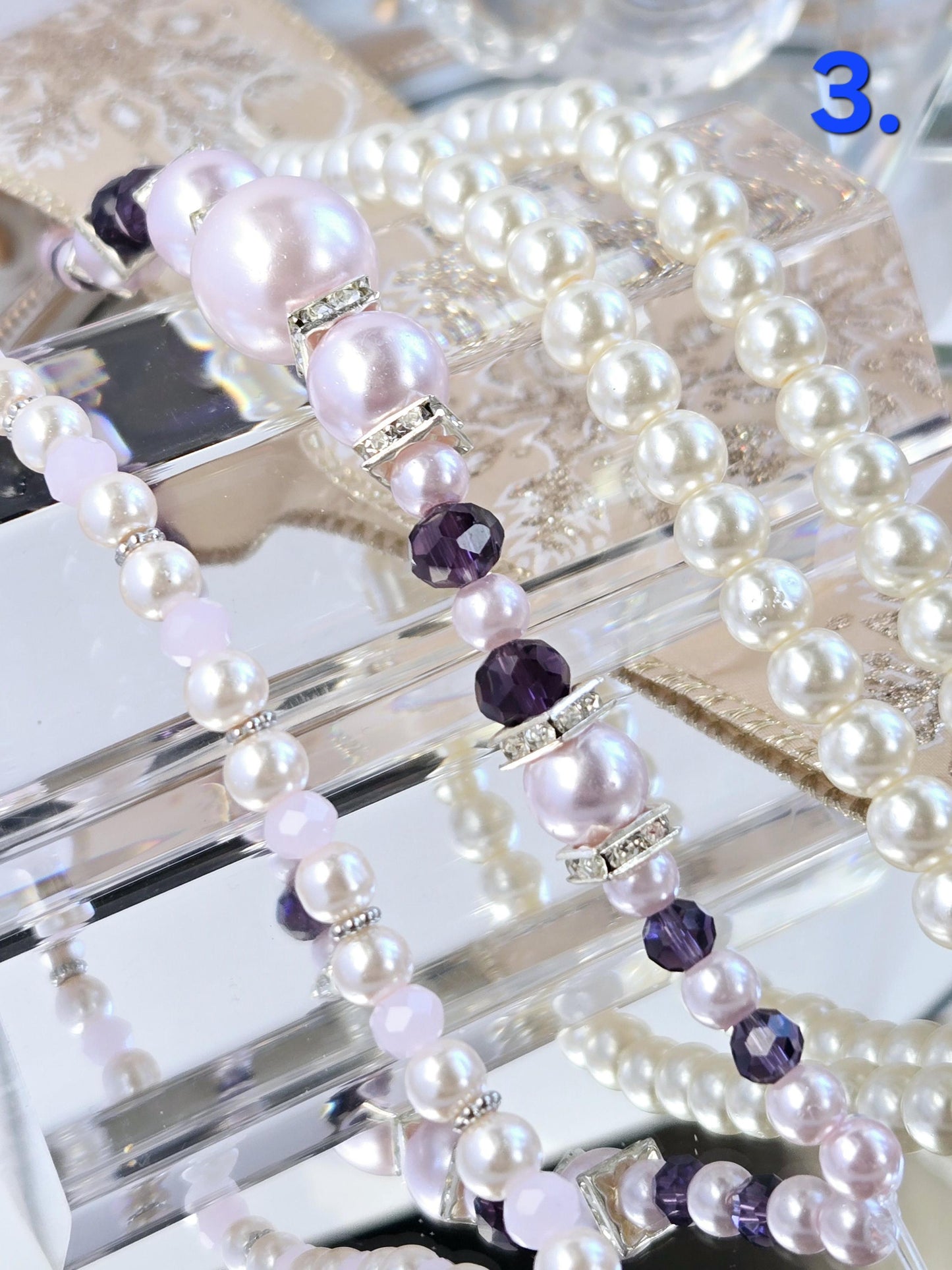 Three Strand Packages of Assorted Glass Pearls and Spacer Beads