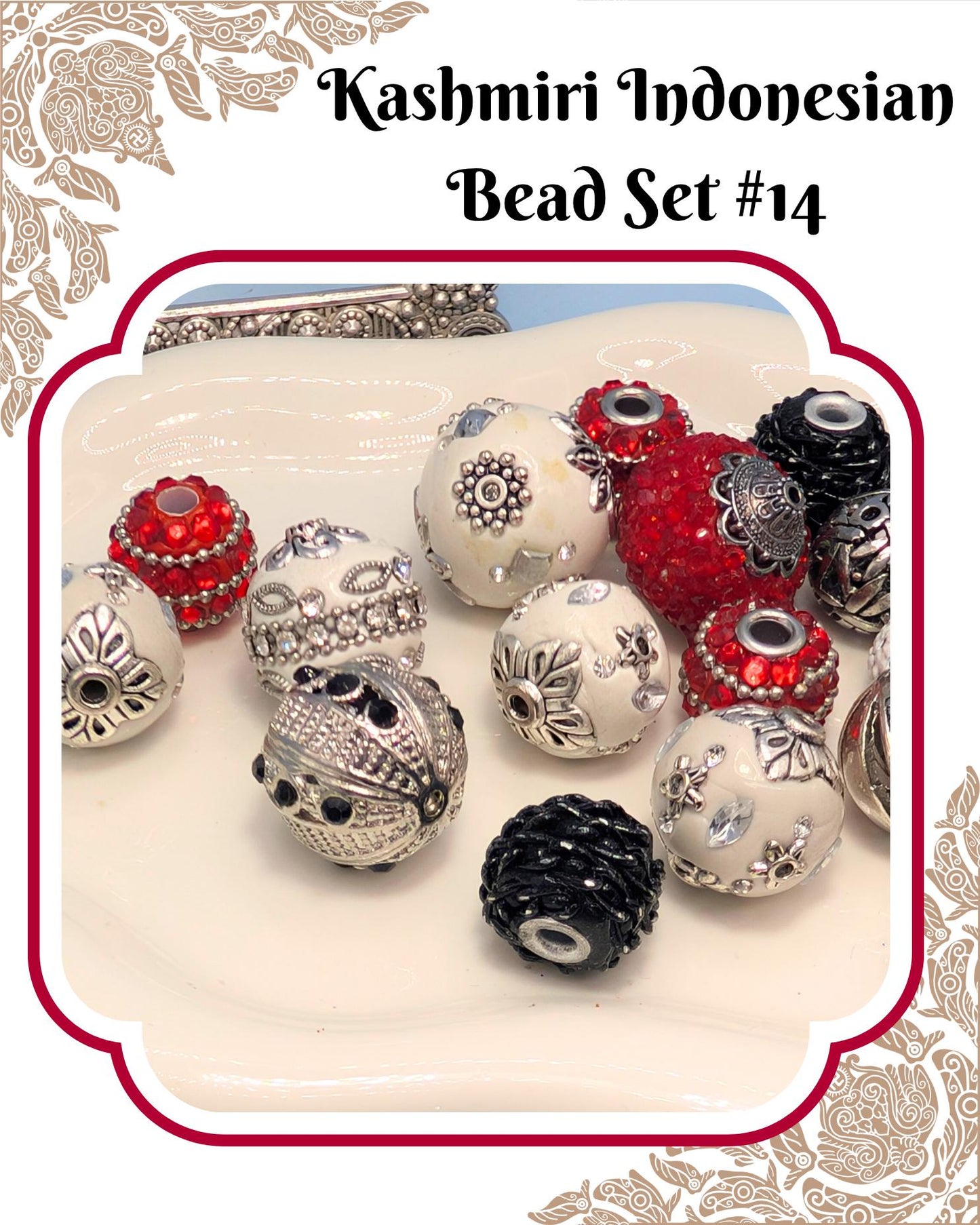 A collection of colorful beads, including red, white, and black ones, arranged on a white surface.