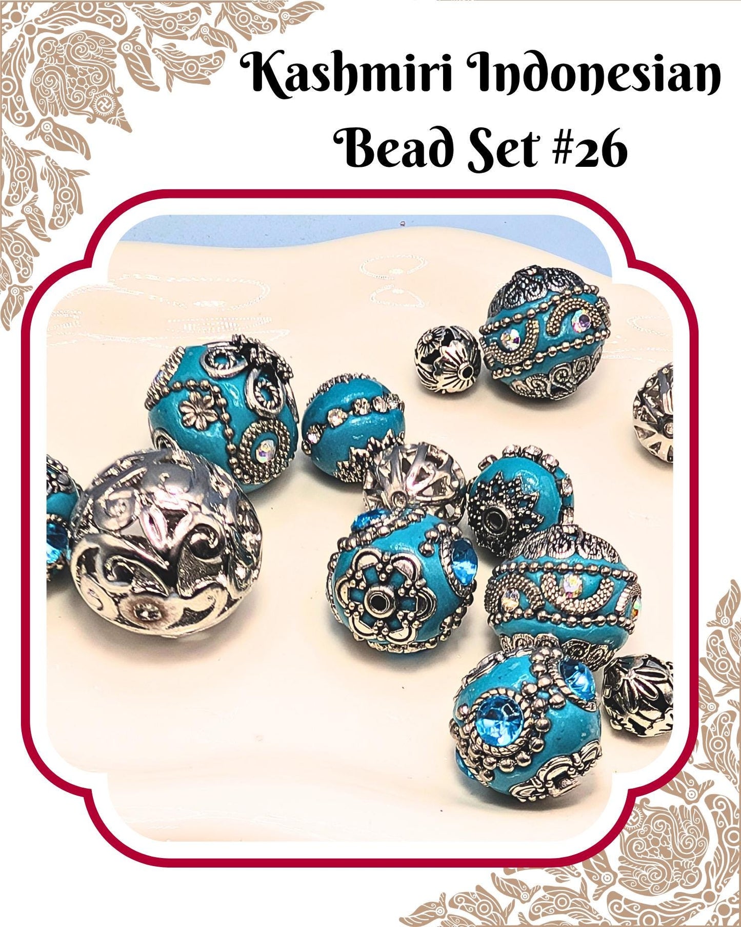 A collection of ornate, turquoise-colored beads in various shapes and sizes, arranged on a white surface.