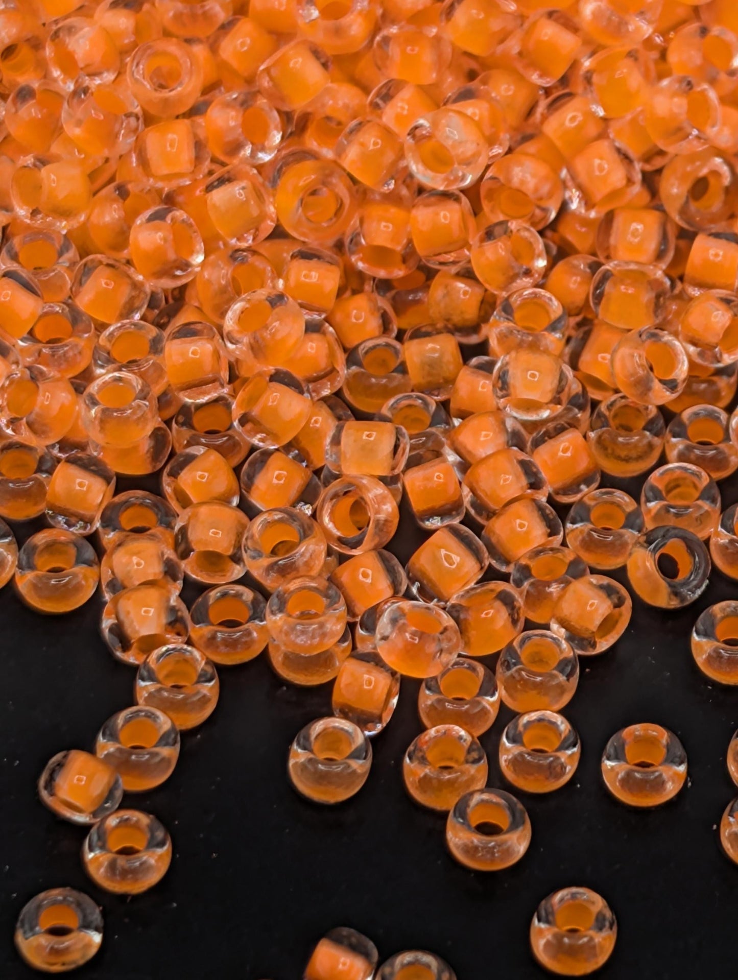 Transparent Neon Orange ICL Size 11/0 15g pkg