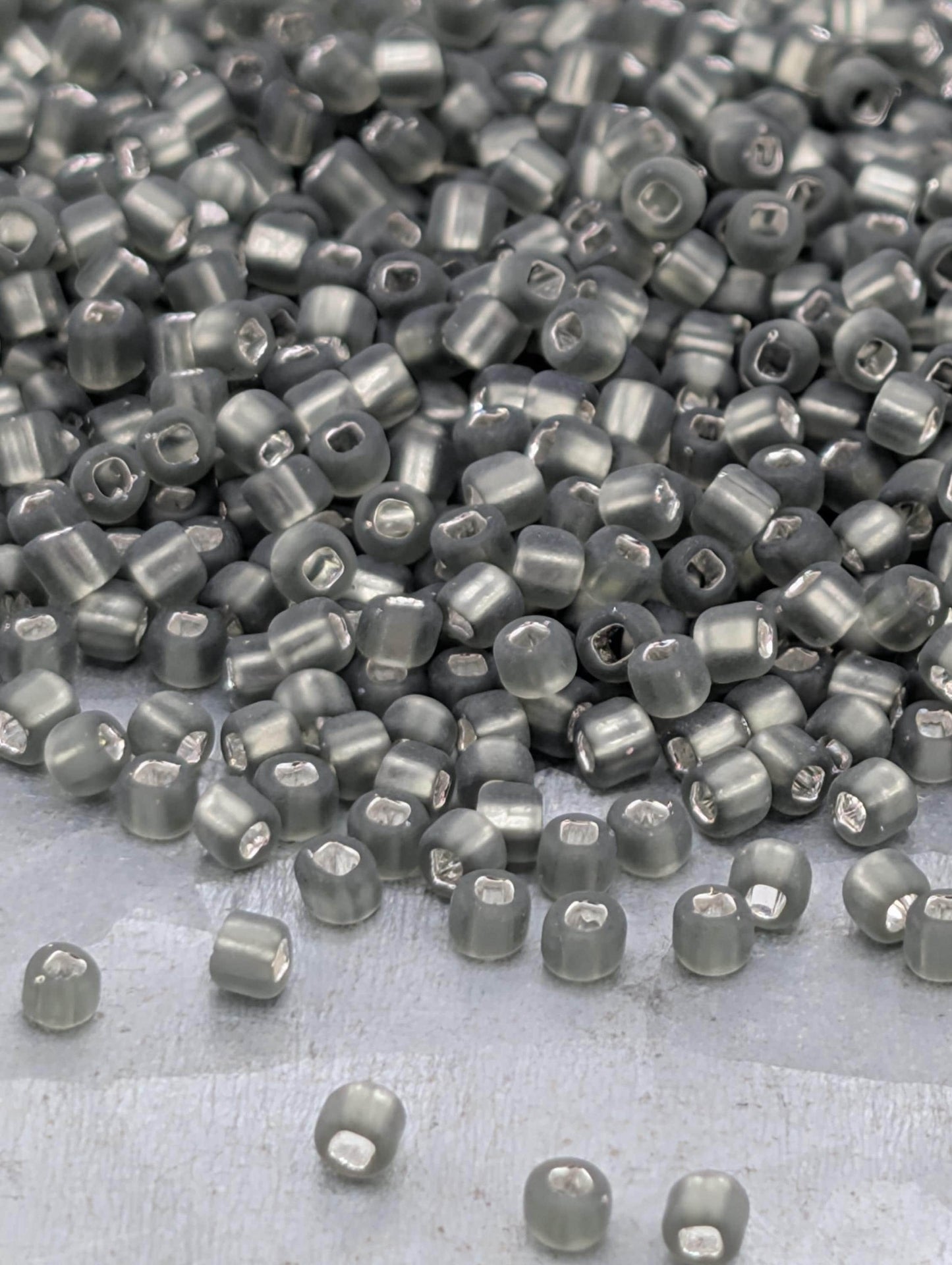 4666SB Translucent Silver Lined Matte Gunmetal 11/0