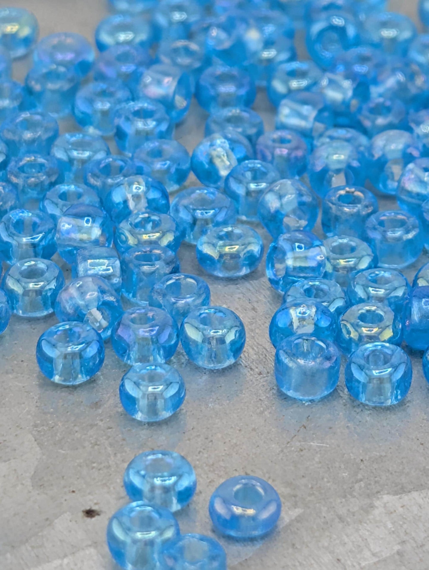 Transparent Sky Blue Rainbow Size 6/0 15g pkg
