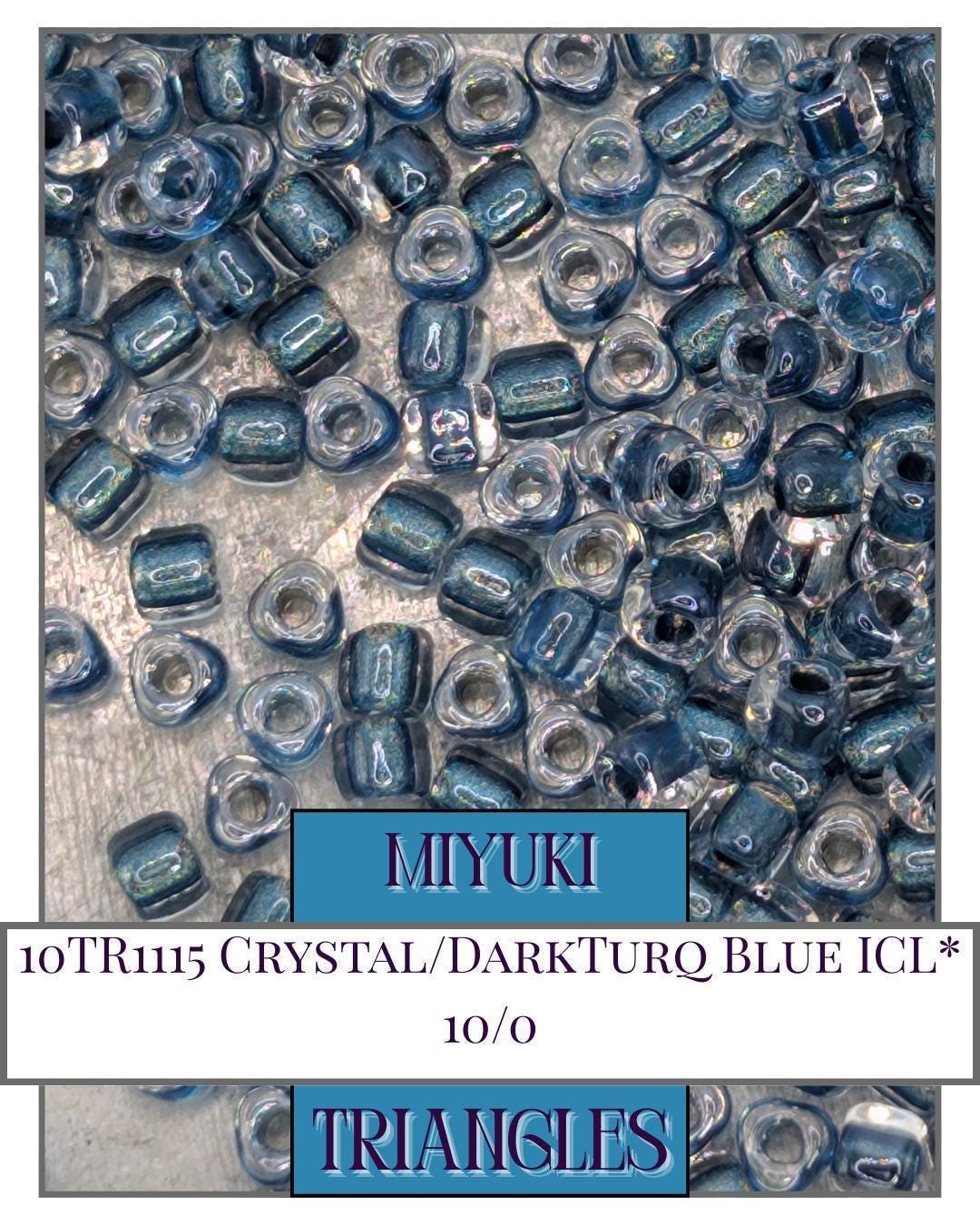 10TR1115-Miyuki Triangle Beads:Crystal/DarkTurq Blue ICL* (10g pkg)