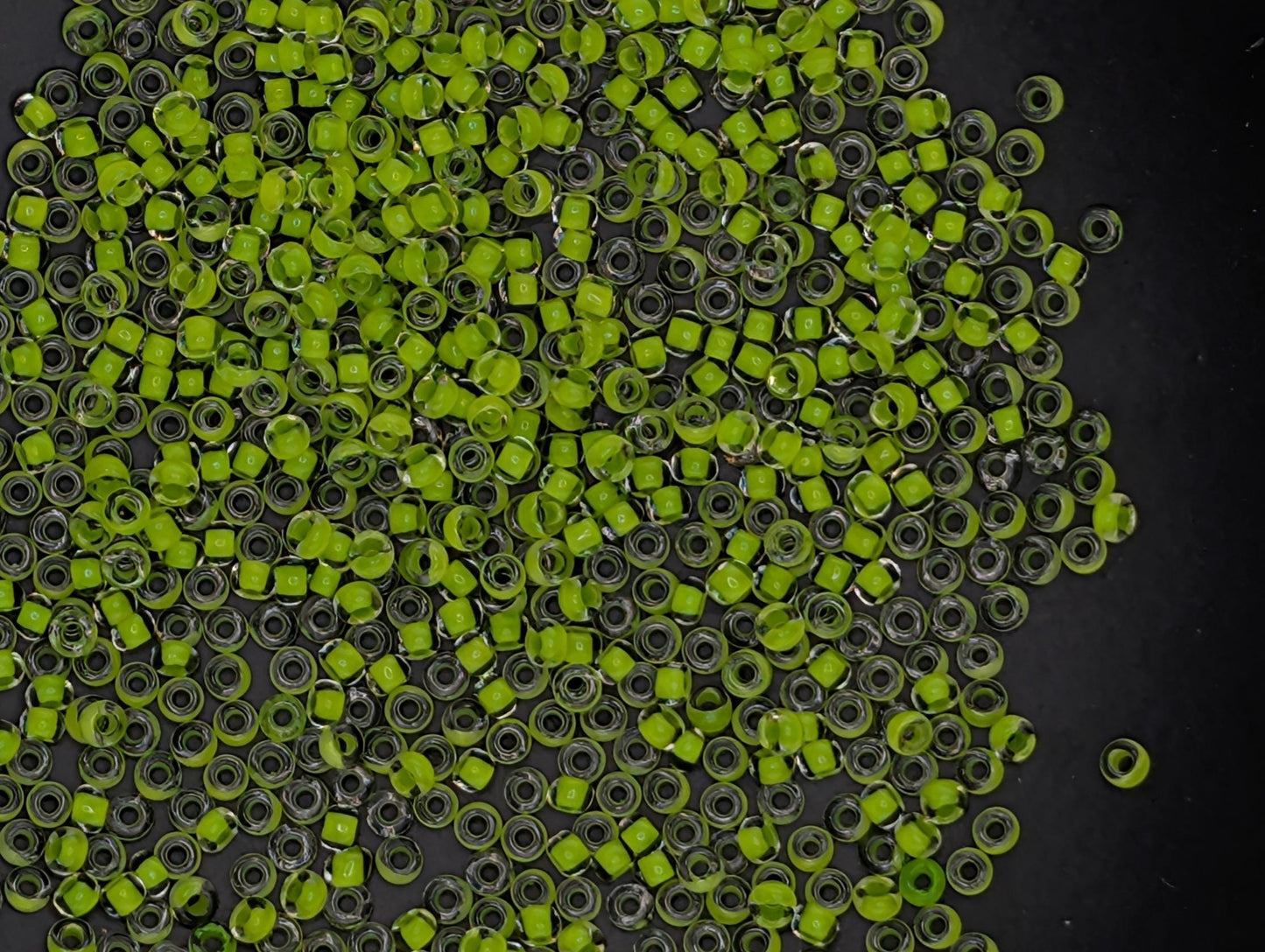Transparent Terra Intensive Lime Green Lined Clear Size 11/0 15g pkg
