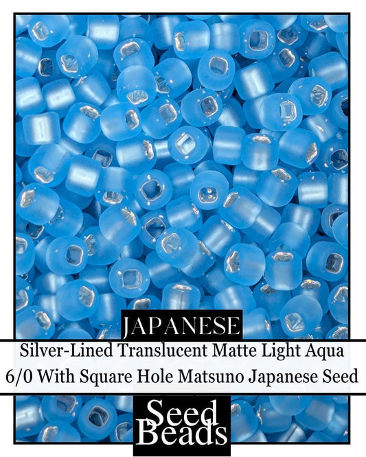 5785SB Silver-Lined Translucent Matte Light Aqua 6/0 With Square Hole (15g pkg)