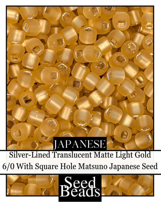 5746SB Silver-Lined Translucent Matte Light Gold 6/0 With Square Hole (15g pkg)
