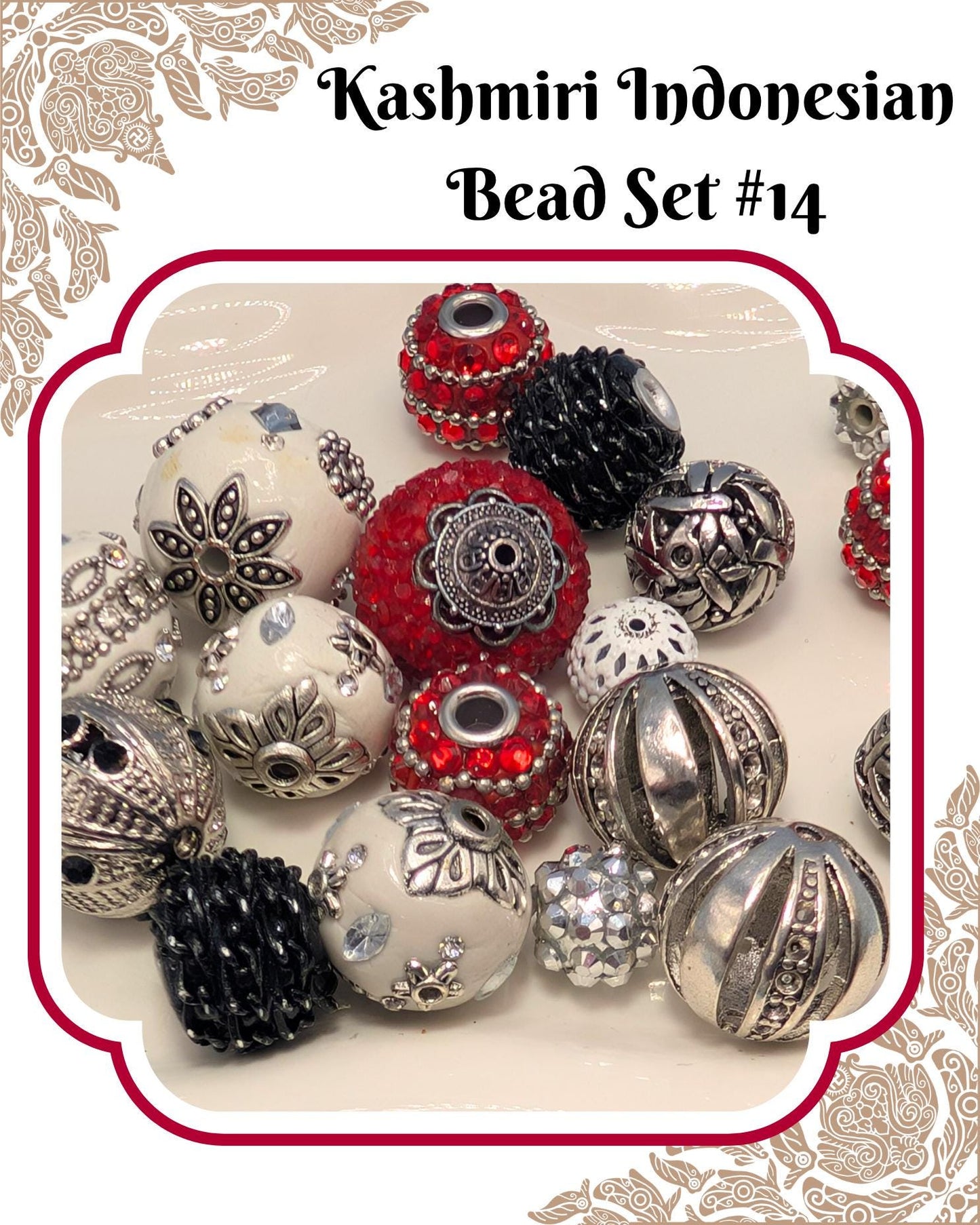 a collection of various beads, including red, silver, and white beads, arranged on a white background.