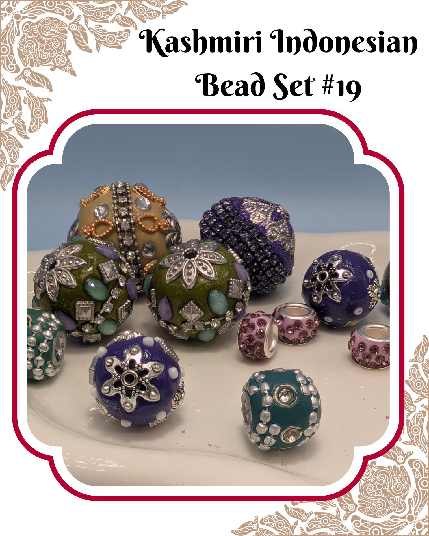 a collection of colorful and intricately designed beads, including various shapes and sizes, arranged on a surface.