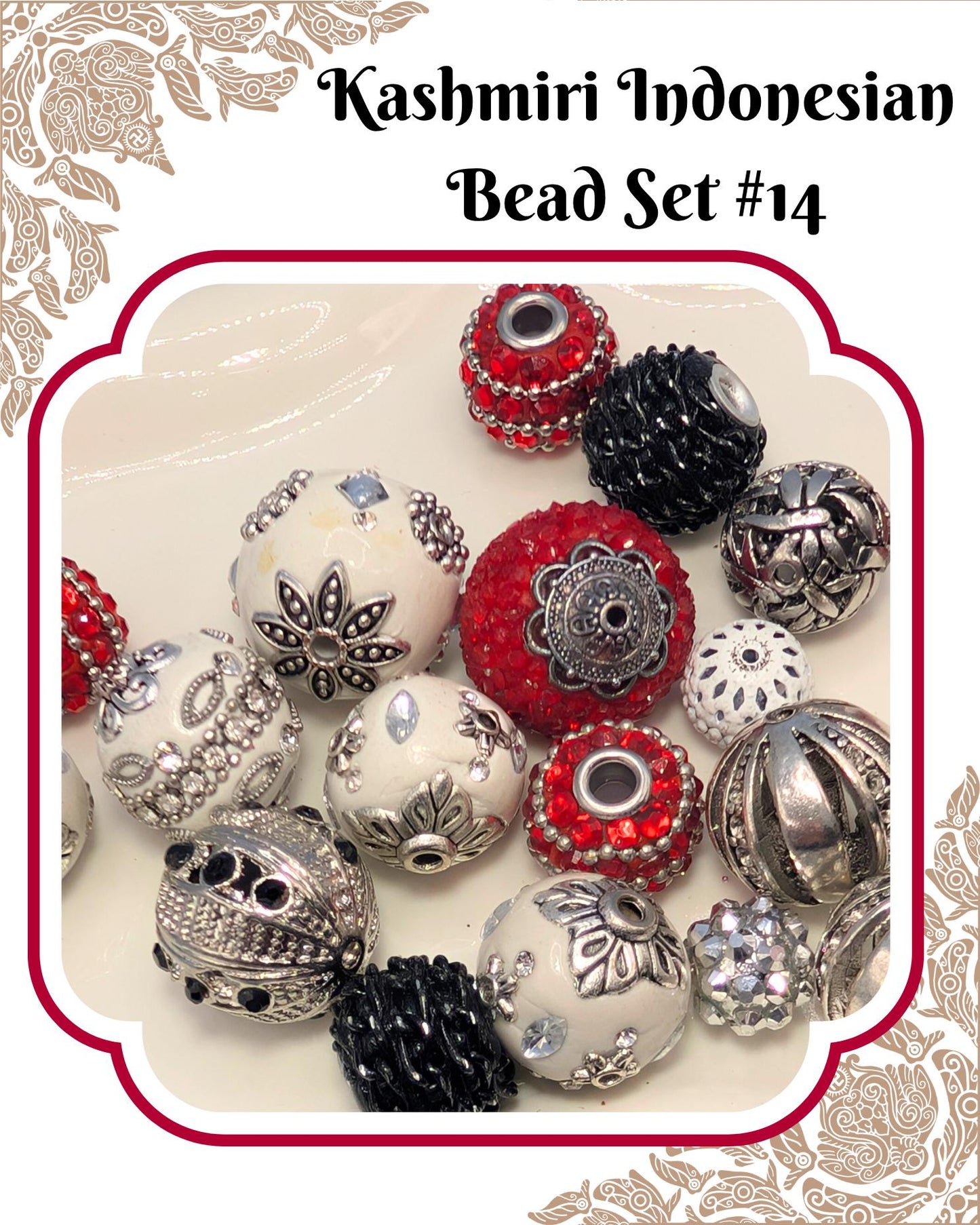 a collection of various beads, including white, black, red, and silver beads, arranged on a surface.