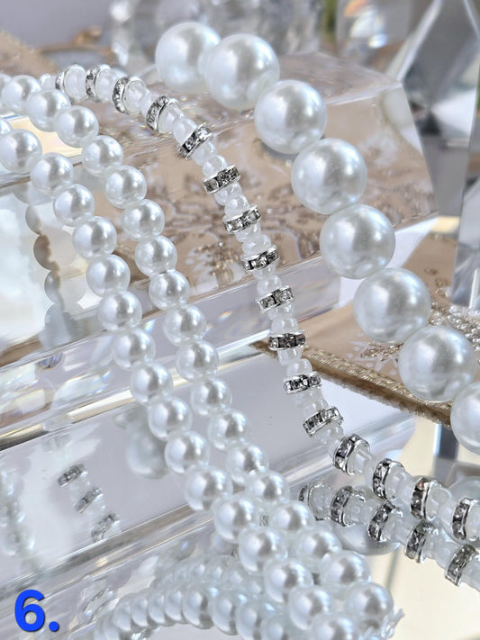 Three Strand Packages of Assorted Glass Pearls and Spacer Beads
