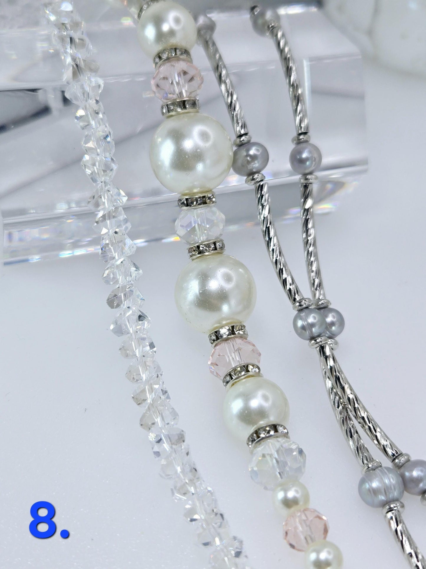 Three Strand Packages of Assorted Glass Pearls and Spacer Beads