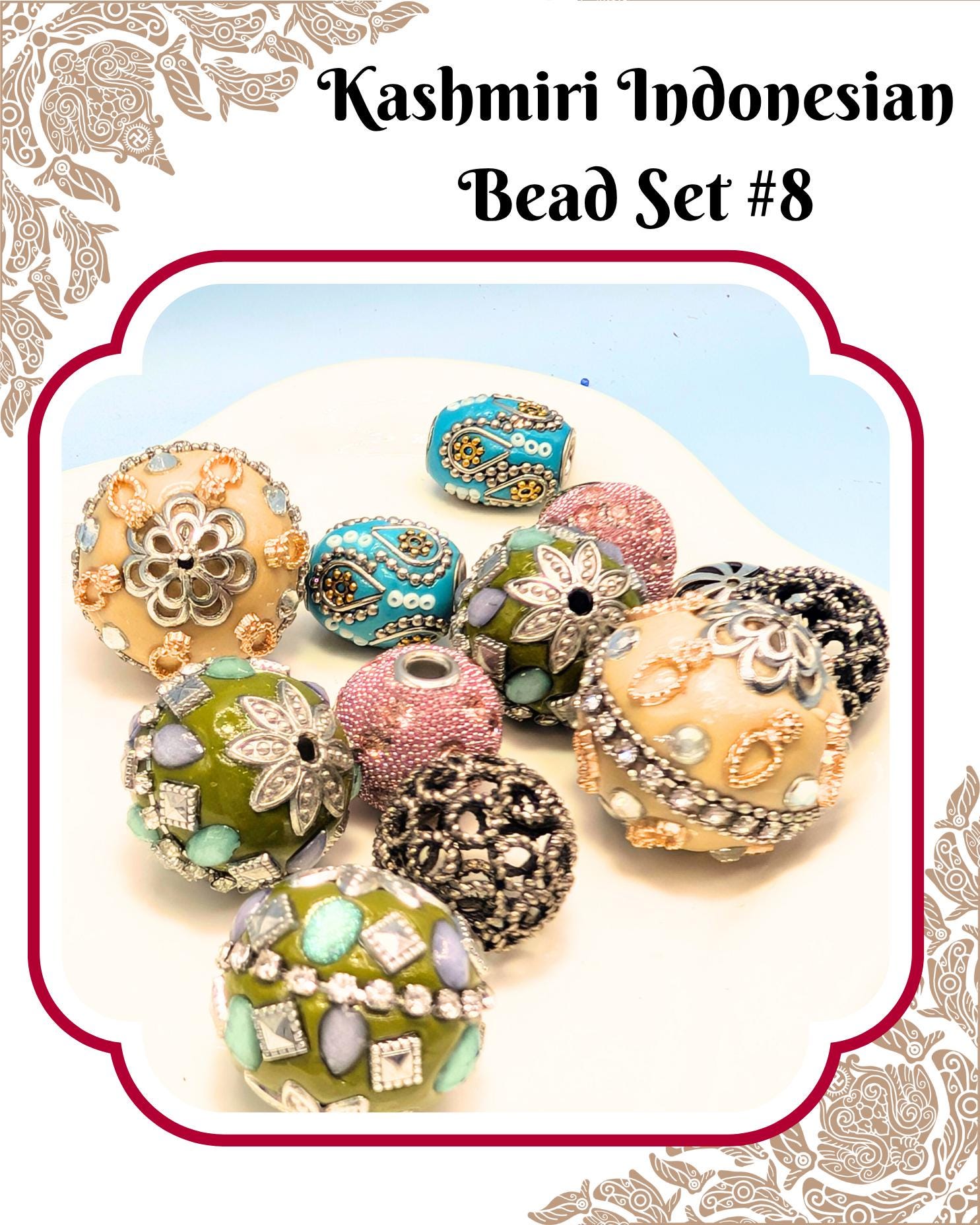 a collection of colorful and intricately designed beads, including various shapes and sizes, arranged on a white surface.