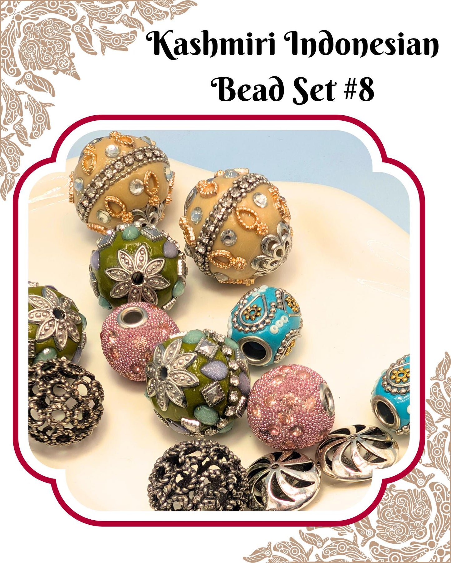 A collection of colorful, intricately designed beads in various shapes and sizes, including round, oval, and spherical beads, as well as some with metallic accents. The beads appear to be part of a bead set, possibly from the Kashmir Indonesian region.