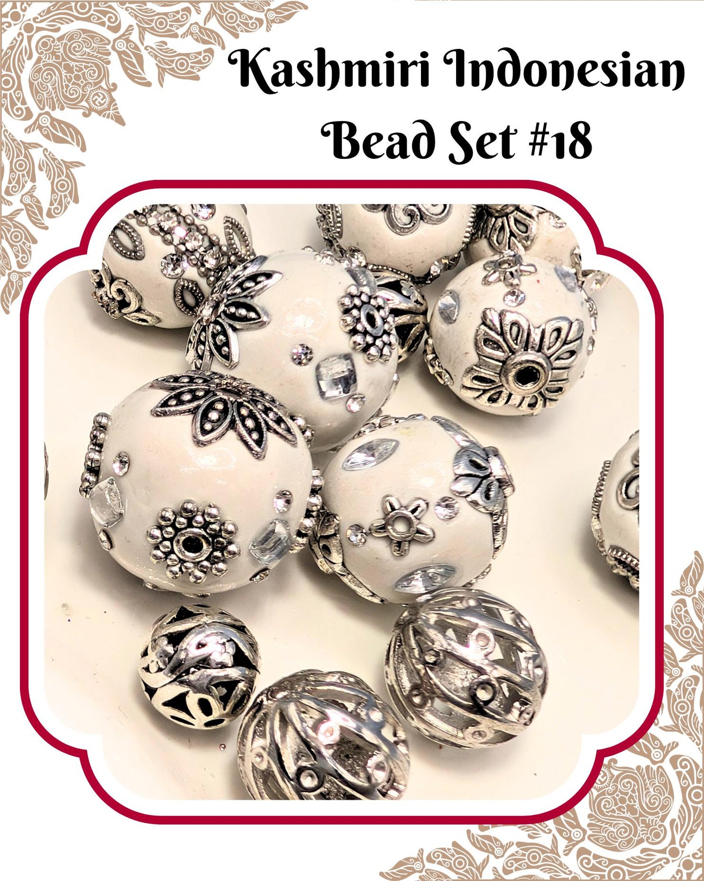 a collection of decorative beads, including white and silver beads with intricate designs and patterns. The beads are arranged in a visually appealing manner, showcasing their craftsmanship and artistic value.