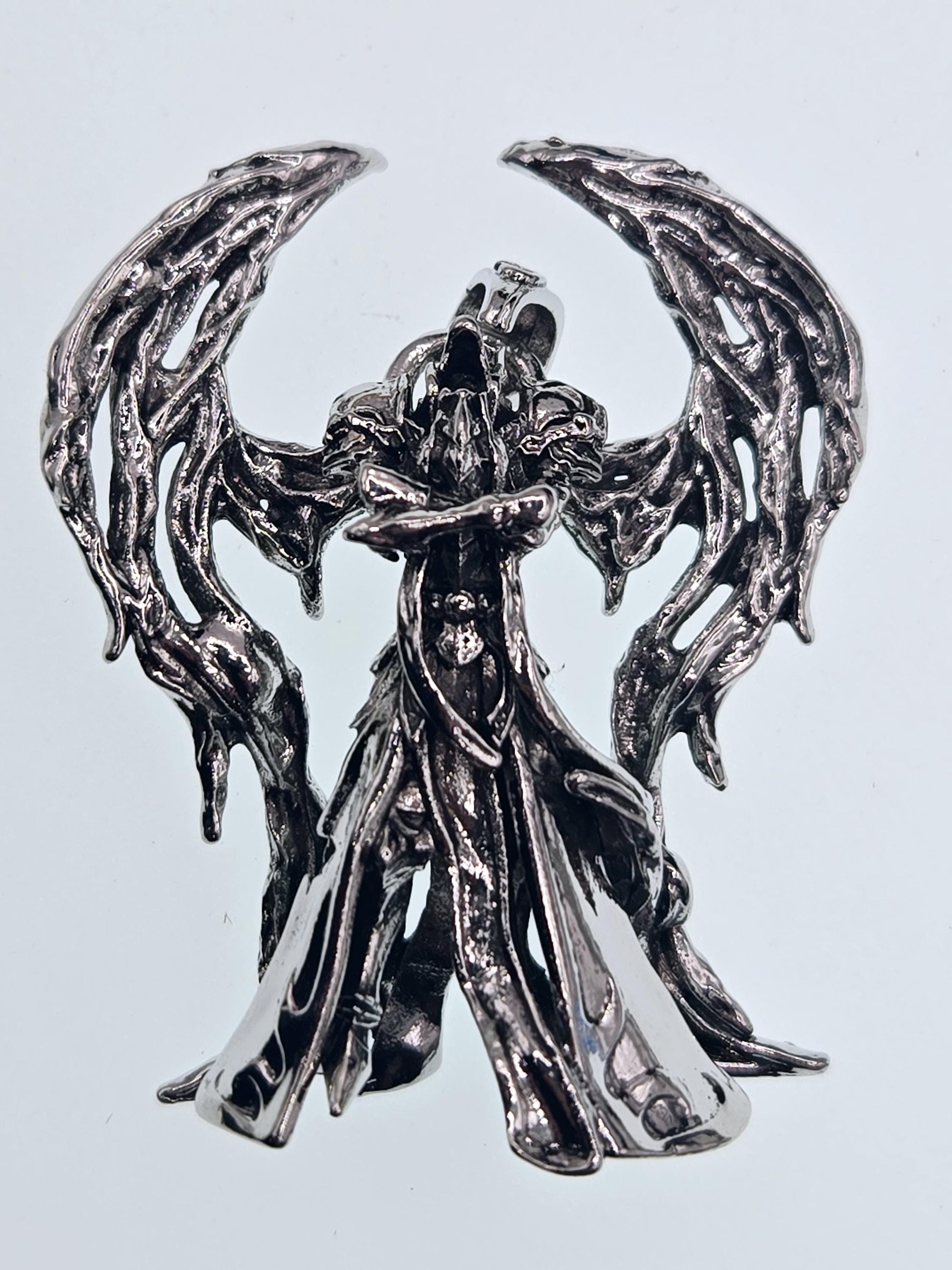 a detailed, intricate metal sculpture with a complex, organic design.