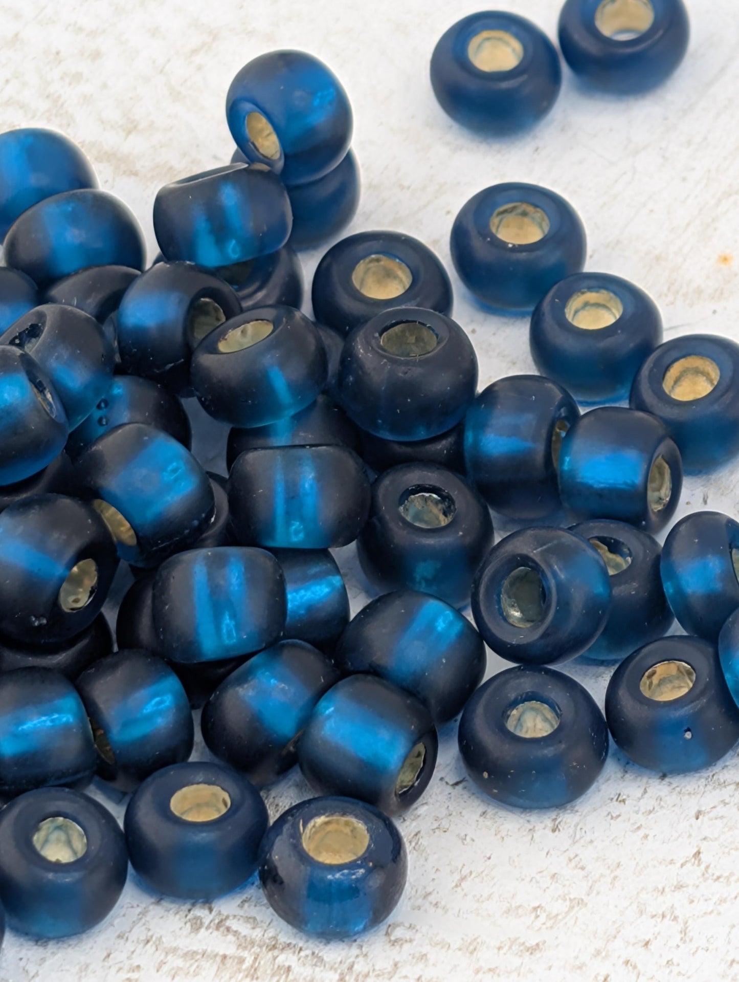 6/0 Semi-matte Teal Silver Lined 15g pkg