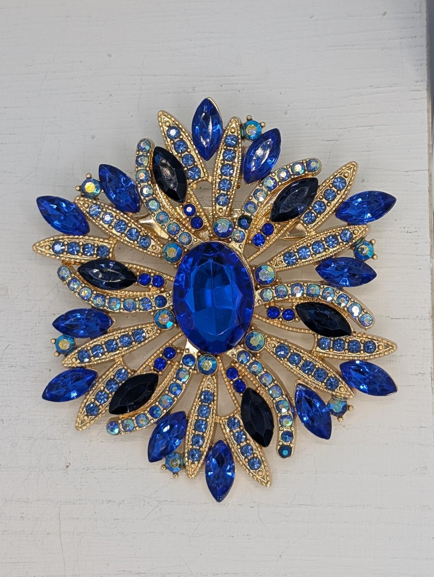 Sapphire Starburst  Golden Plate Brooch