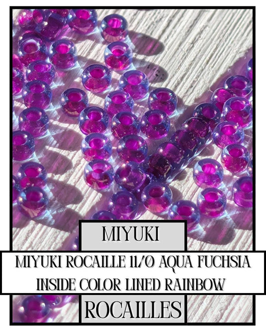 11-0340 Miyuki Rocailles 11/0 | Aqua/Fuchsia Inside Color Lined/R 20g