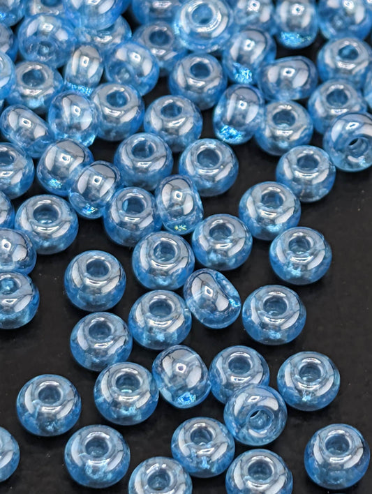Preciosa 6/0 Rocaille, Translucent Luster Arabian Blue. 15g pkg