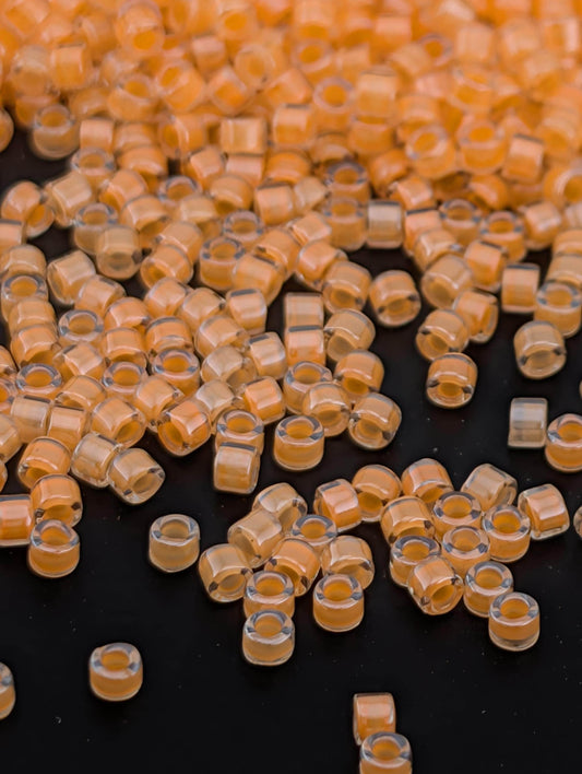 DB2033-Miyuki Delica 11/0:Luminous Creamsicle ICL (7 gram pkg ~1400 Pcs)
