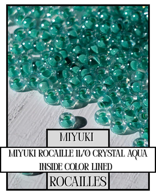 11-0219 Miyuki Rocailles 11/0 | Crystal/Aqua Inside Color Lined 20g