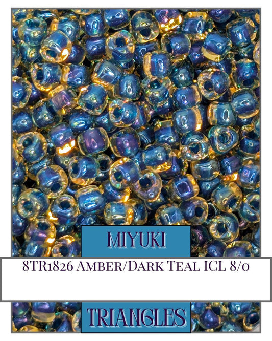 8TR1826-Miyuki Triangle Beads:Amber/Dark Teal ICL (10g pkg)