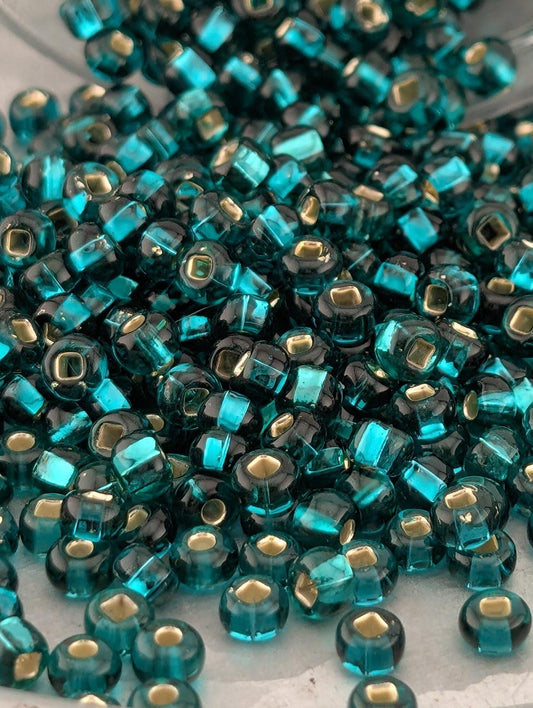 Transparent Teal Green Silver-Lined Size 6/0 15g pkg