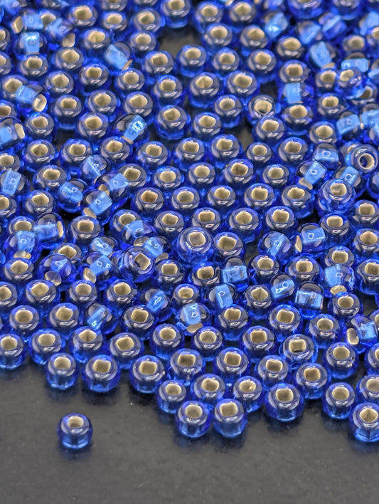 Transparent Silver-Lined Sapphire Blue Size 11/0   15g pkg