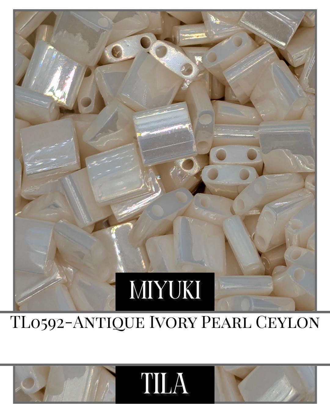 TL0592-Miyuki Tila Beads:Antique Ivory Pearl C (7.5g pkg)