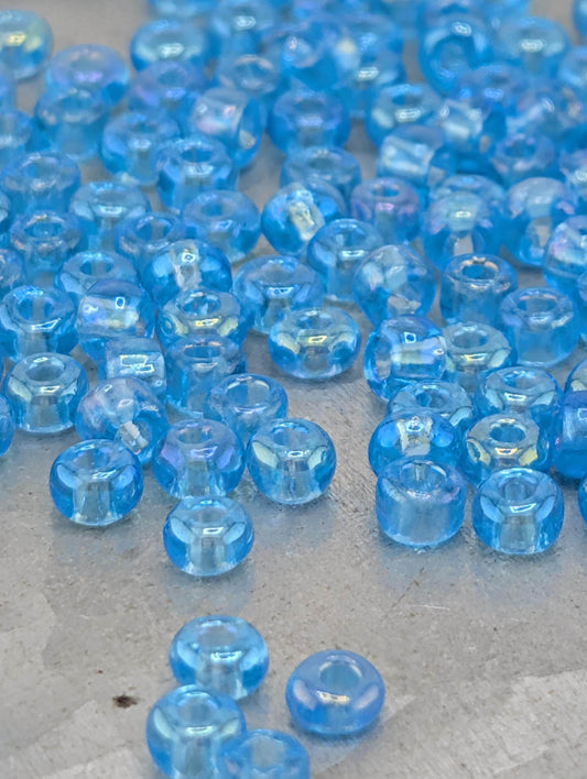 Transparent Sky Blue Rainbow Size 6/0 15g pkg