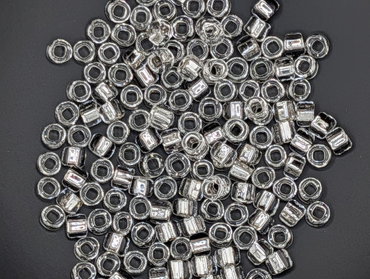 5101SB Silver Lined Translucent Clear Round With Square Hole 6/0 (15g Pkg)