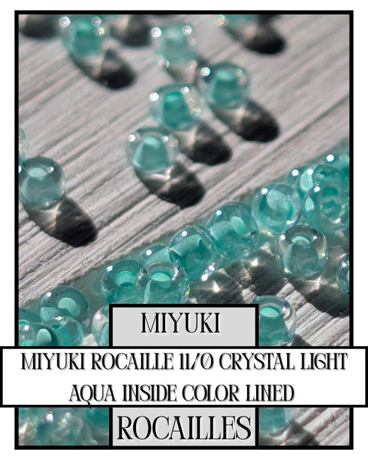 11-0218 Miyuki Rocailles 11/0 | Crystal/Light Aqua Inside Color Lined 20g