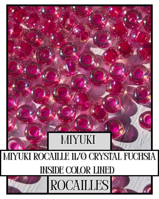 11-0209 Miyuki Rocailles 11/0 | Crystal/Fuchsia Inside Color Lined 20g