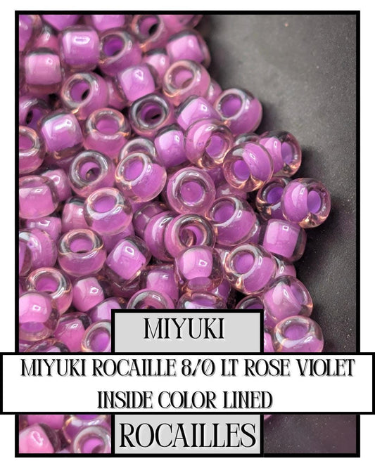 8-2650 Miyuki Rocaille 8/0 | Lt Rose/Violet Inside Color Lined 20g