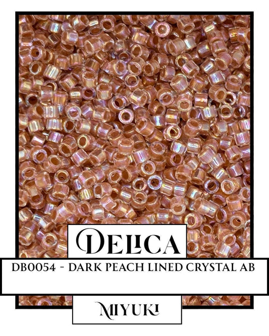 DB0054-Miyuki Delica 11/0:Crystal/Peachy Gold ICL/R (7 gram pkg ~1400 Pcs)