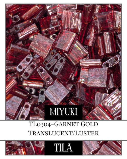 TL0304-Miyuki Tila Beads:Garnet Gold T/L (7.5g pkg)
