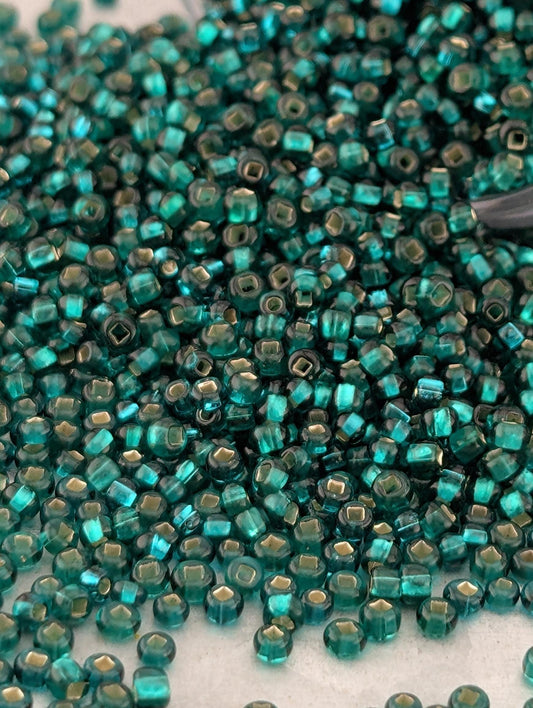 Transparent Teal Green Silver-Lined Size 11/0 15g pkg