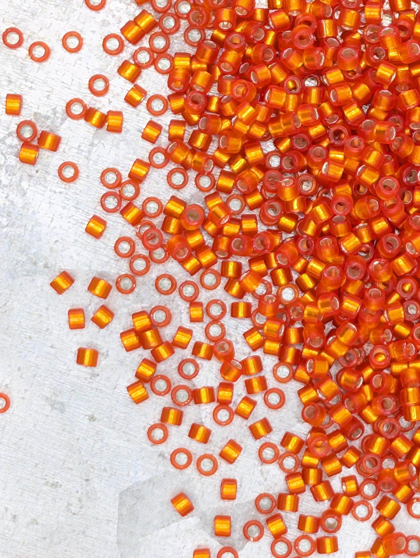 DB0682-Miyuki Delica 11/0:Dark Orange T/SL/S-MA (D) (7 gram pkg ~1400 Pcs)