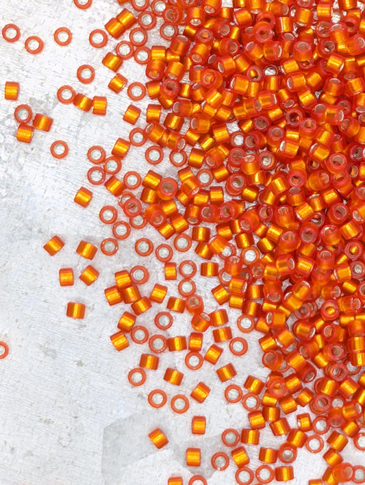 DB0682-Miyuki Delica 11/0:Dark Orange T/SL/S-MA (D) (7 gram pkg ~1400 Pcs)