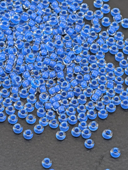 Transparent Terra Intensive Blue Lined Clear Size 11/0 15g pkg