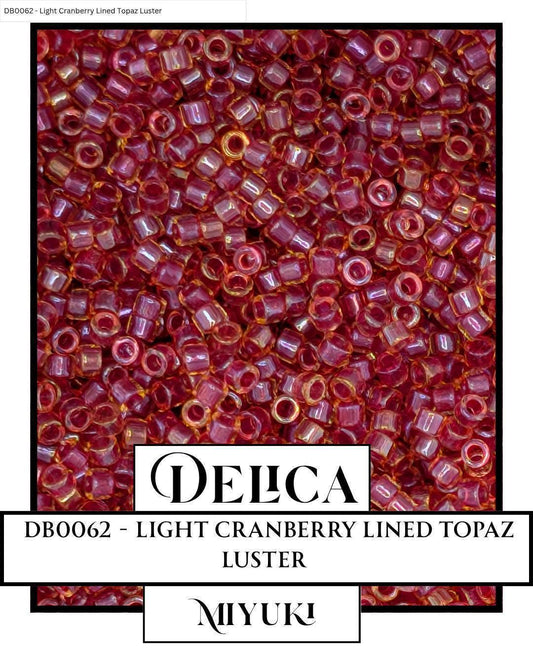 DB0062-Miyuki Delica 11/0:Light Cranberry Lined Topaz Luster  (7 gram pkg ~1400 Pcs)