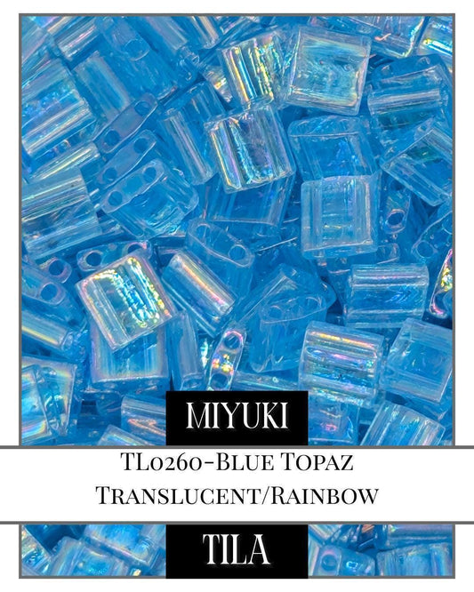 TL0260-Miyuki Tila Beads:Blue Topaz T/R (7.5g pkg)