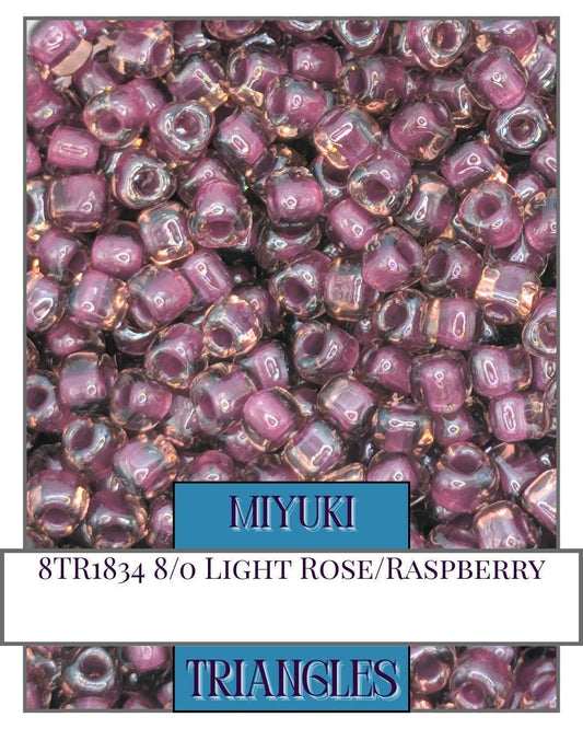 8TR1834-Miyuki Triangle Beads:Lt Rose/Raspberry ICL (10g pkg)