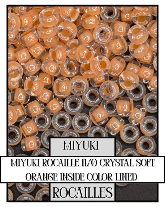 11-0212 Miyuki Rocailles 11/0 | Crystal/Soft Orange Inside Color Lined 20g